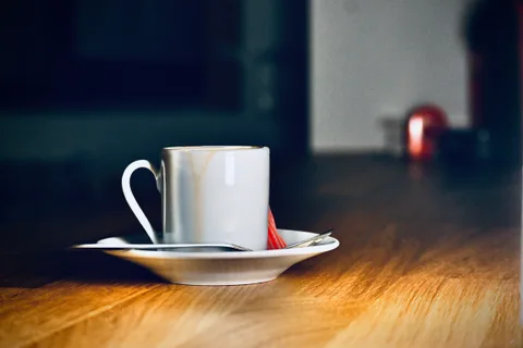 calm, coffee, cup, indoor, muted colours, saucer, texture, warm light